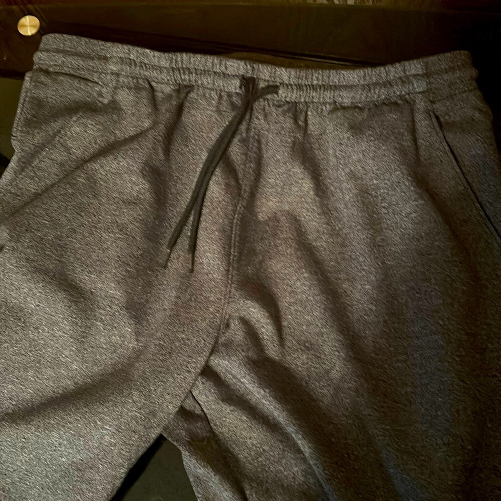 Comfy I’ve never worn them there dark gray you can adjust string